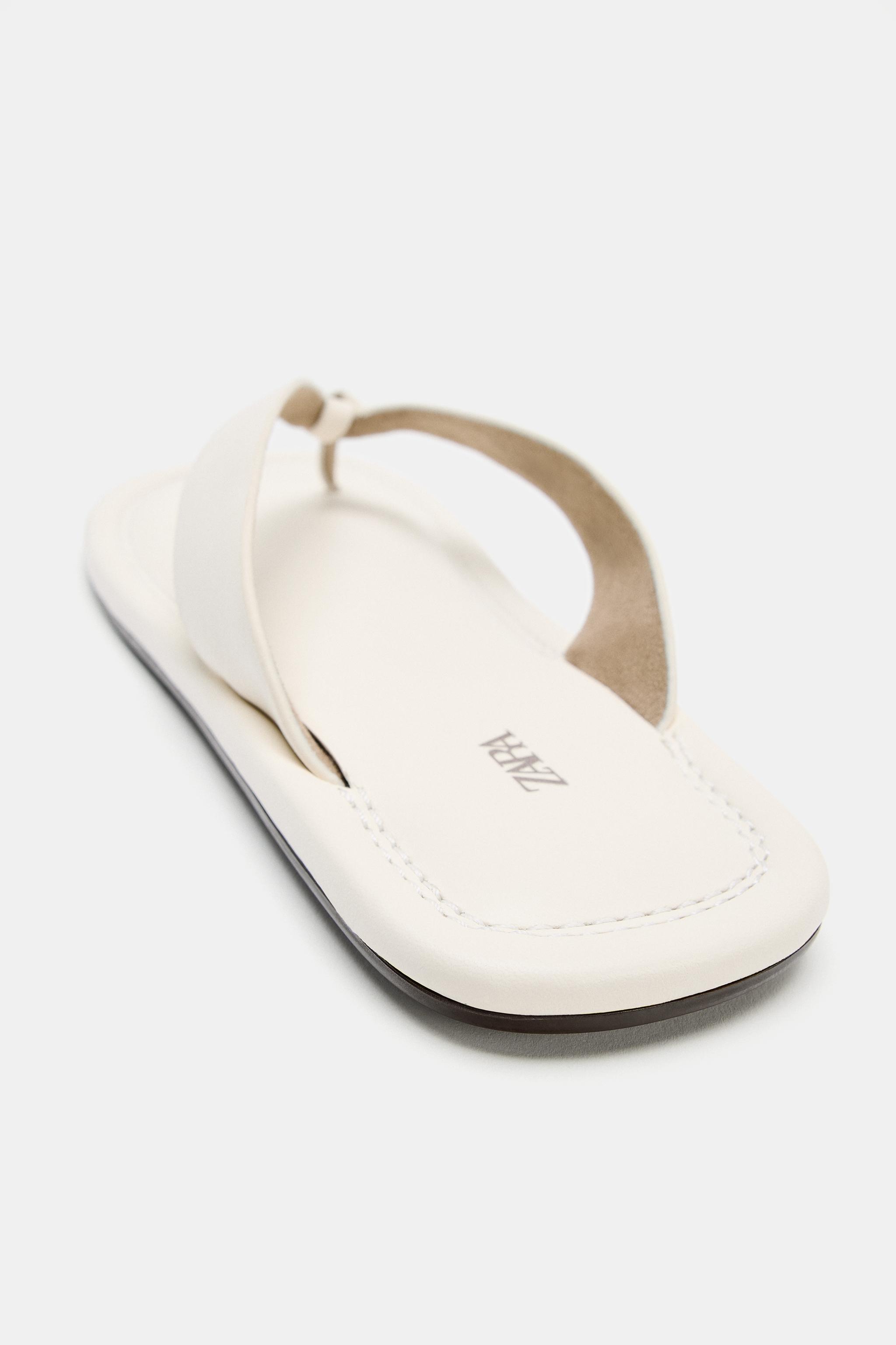 SANDALES PLATES EN CUIR